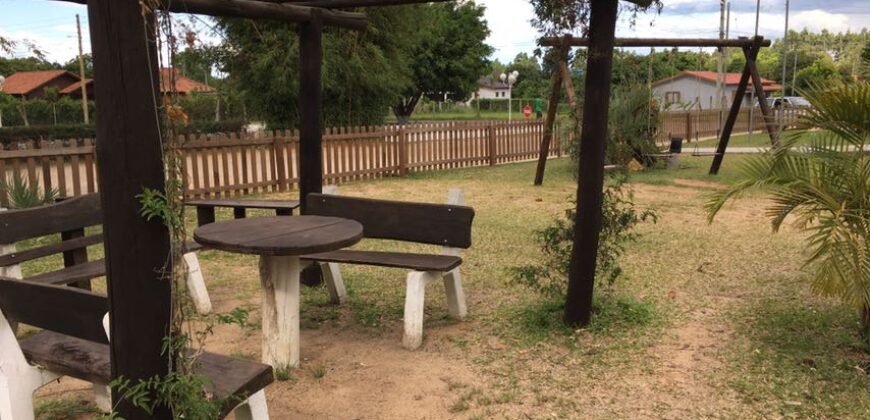 sítio em condomínio fechado com casa de costaneira duplada