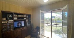 sítio em condomínio fechado com casa de costaneira duplada