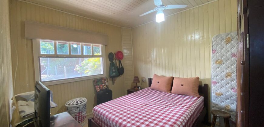 sítio em condomínio fechado com casa de costaneira duplada