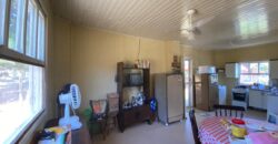 sítio em condomínio fechado com casa de costaneira duplada