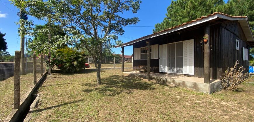 sítio em condomínio fechado com casa de costaneira duplada