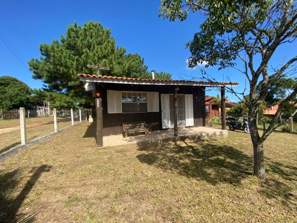 sítio em condomínio fechado com casa de costaneira duplada