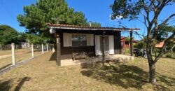 sítio em condomínio fechado com casa de costaneira duplada