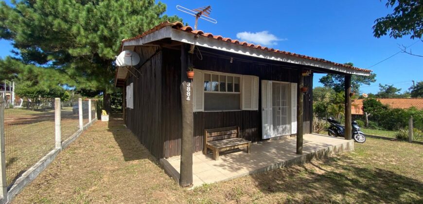 sítio em condomínio fechado com casa de costaneira duplada