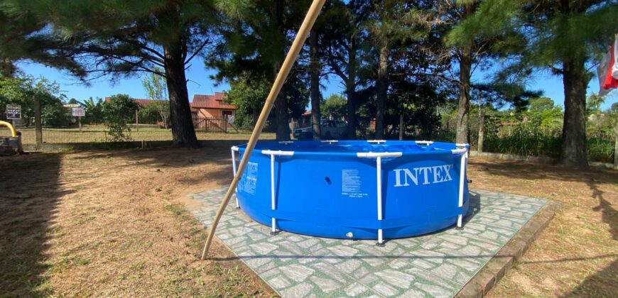 sítio em condomínio fechado com casa de costaneira duplada